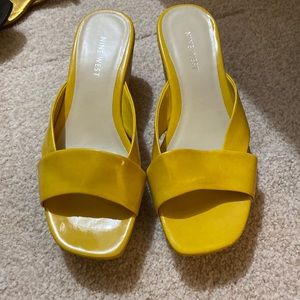 Never worn yellow cork wedges